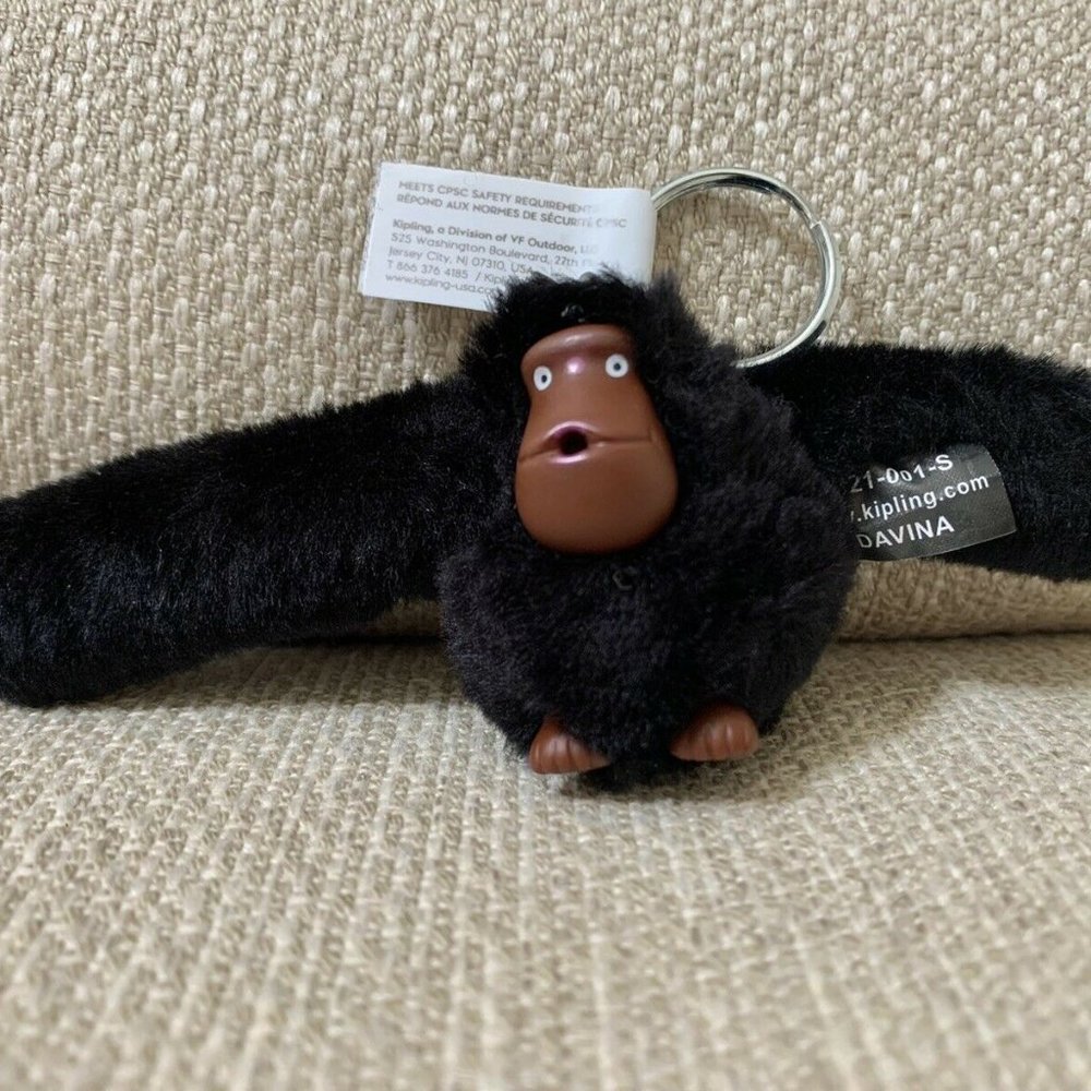 FREE with a bundle (two more items). Kipling monkey keychain.
